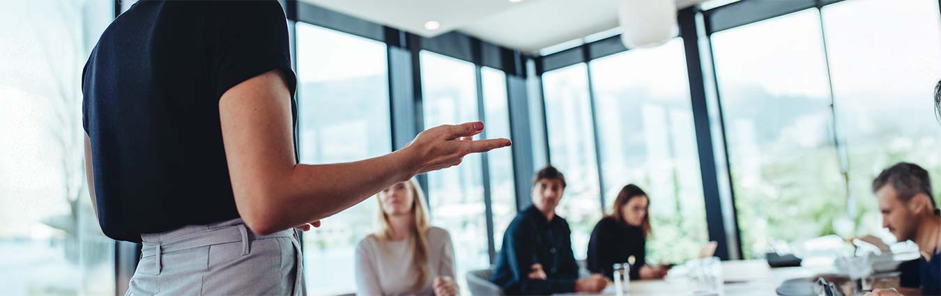 Businesswoman making a presentation to her colleagues in office